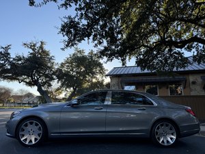 Luxury black sedan used for Austin wedding getaway car
